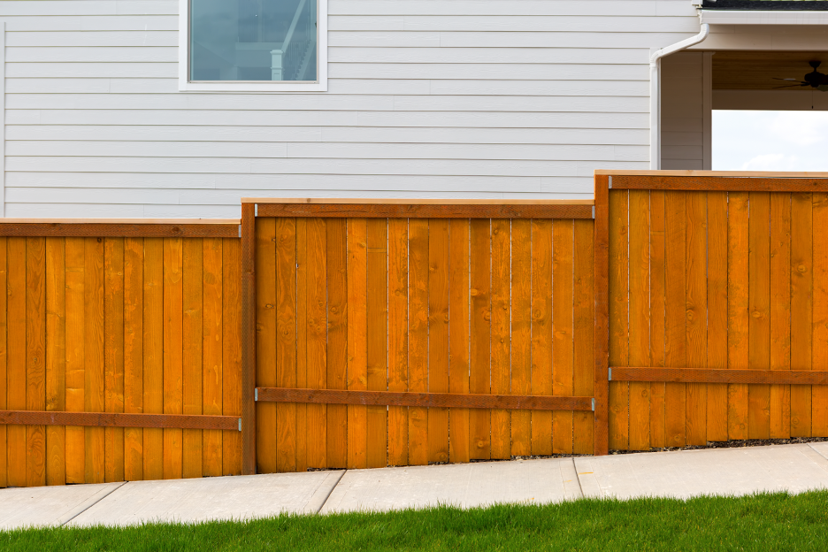 Residential backyard wood fence at a house in Highwood, Illinois