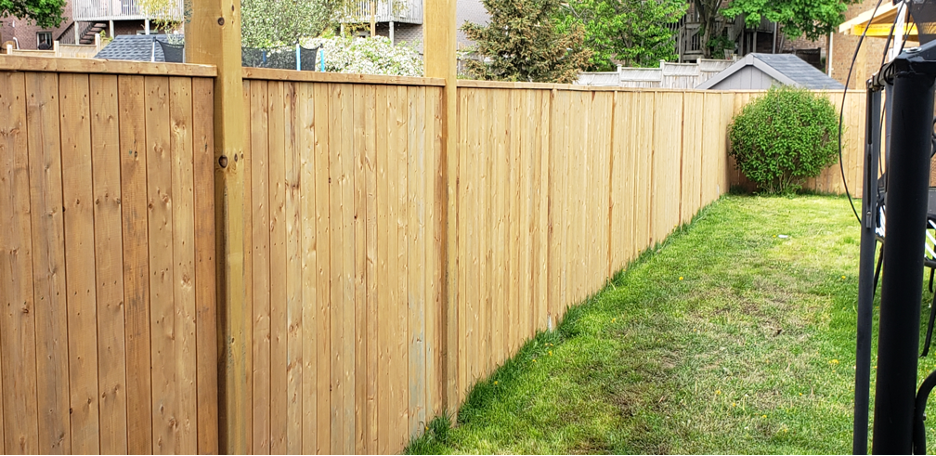 Residential wooden fence in the backyard of a house in Mundelein, Illinois